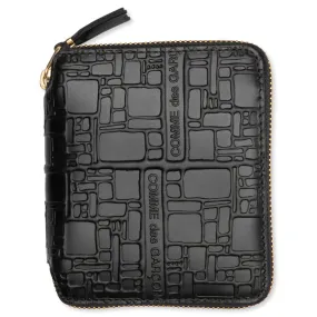 Black Comme des Garcons Embossed Logo Wallet