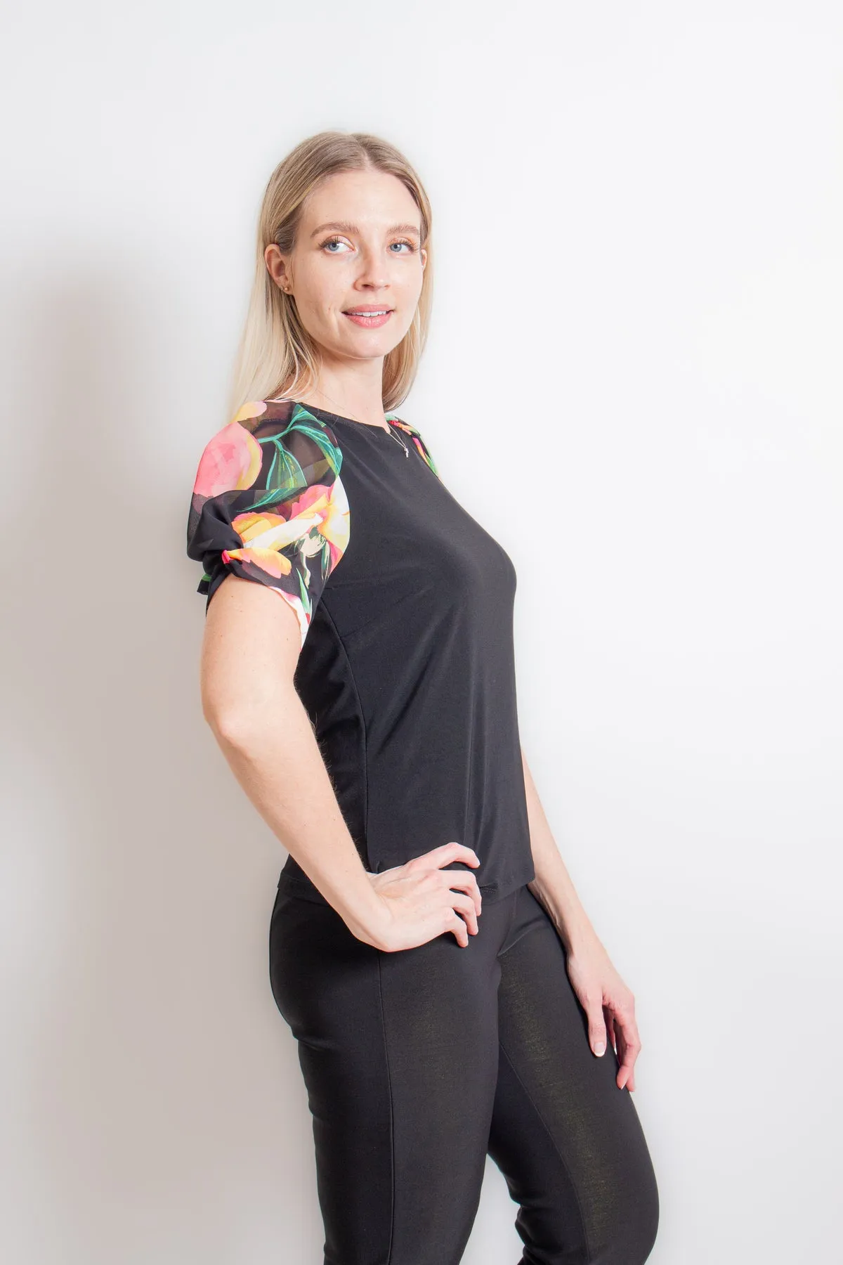 Black Top with Puff Sleeves featuring Floral design